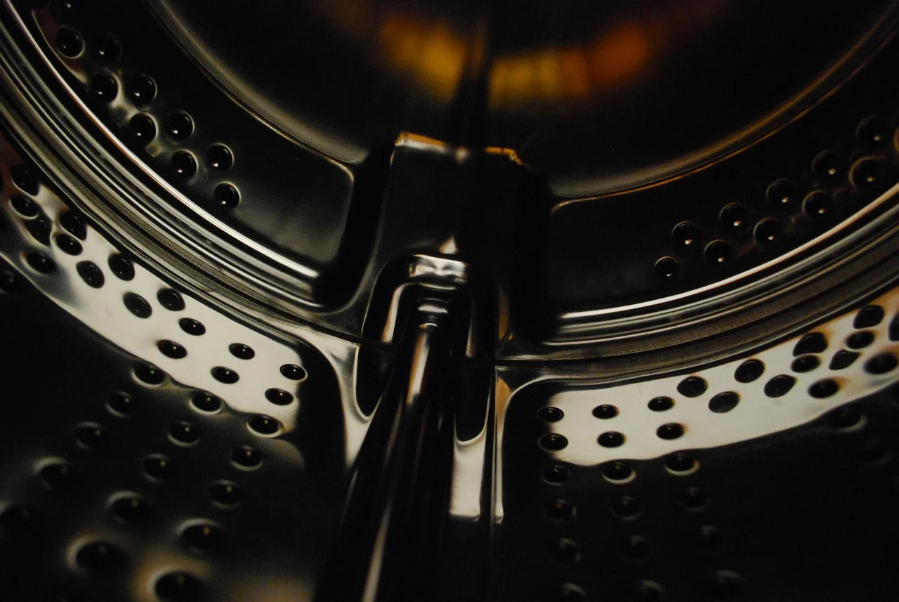washing, machine, inside, grey, drum, close. Brands that matter in laundromat equipment